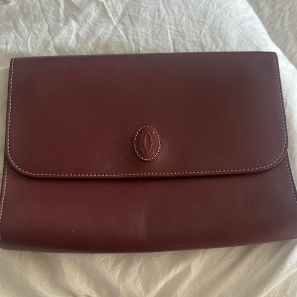 Cartier Burgundy Leather clutch bag with Flap Closure